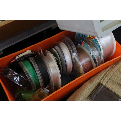 351 - Large quantity of Fishing Tackle to include seven fixed spool reels, four fishing boxes containing s... 