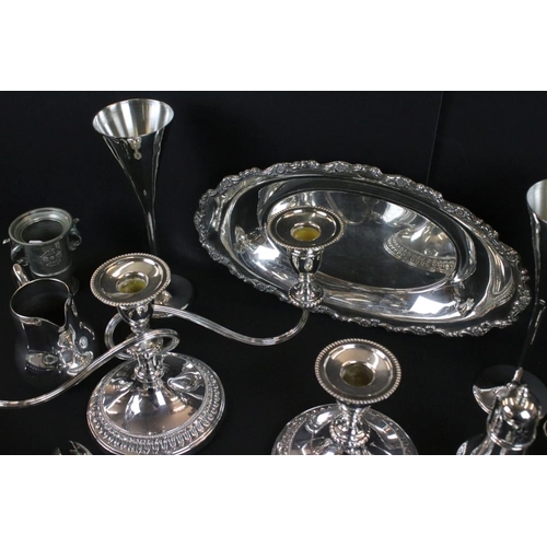 362 - A collection of mixed silver plate to include candlesticks, goblets, trays, cutlery, sugar shaker...... 