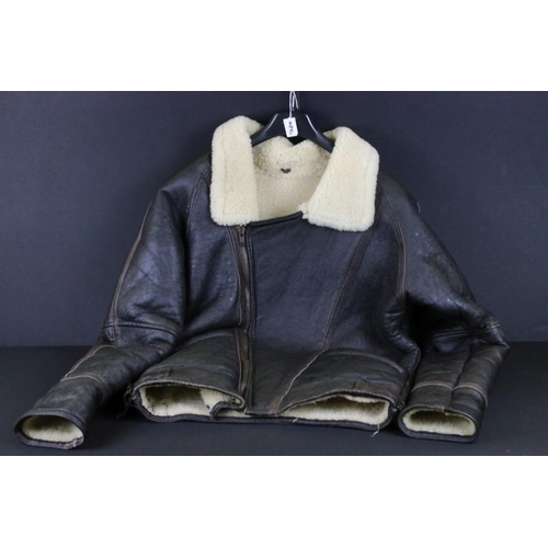 367 - 20th Century sheepskin jacket coat with zip closure and buckle adjustments. Shoulders measure approx... 