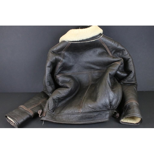 367 - 20th Century sheepskin jacket coat with zip closure and buckle adjustments. Shoulders measure approx... 