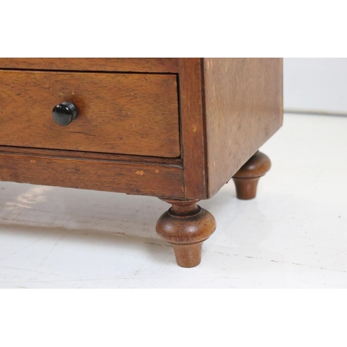 563 - Late 19th / Early 20th century Mahogany Table Top Cabinet comprising two short and four long drawers... 