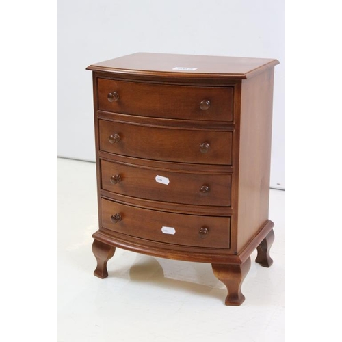 565 - Mahogany Table Top Cabinet in the form of a 19th century Bow Front Chest of Four Drawers, 30cm wide ... 