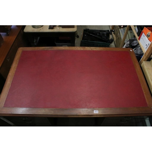 573 - Late Mid century British Rail (Western Region) Partners Desk, the red leather inset top supported by... 