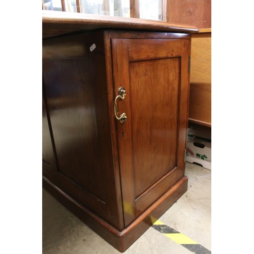 573 - Late Mid century British Rail (Western Region) Partners Desk, the red leather inset top supported by... 