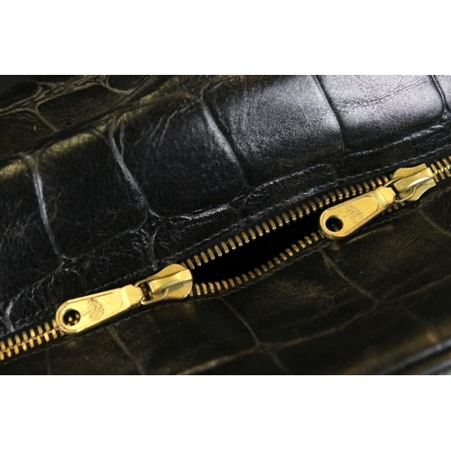 375 - Mulberry black alligator skin embossed holdall weekend bag. The bag having gold tone hardware with c... 