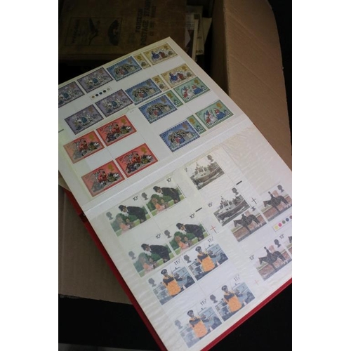 378 - Collection of stamps across two boxes to include assorted loose first day covers, presentation packs... 