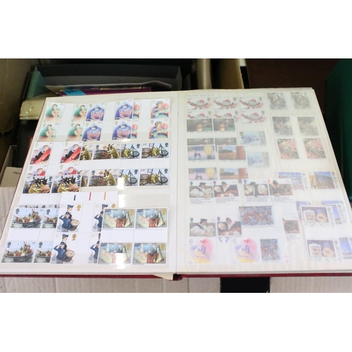 378 - Collection of stamps across two boxes to include assorted loose first day covers, presentation packs... 