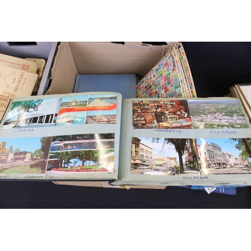 384 - Collection of stamps and cigarette cards across three boxes to include an album of definitives datin... 