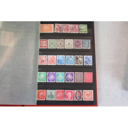 394 - Stamps and first day covers, three albums, to include British and Worldwide examples, a 1977 The Que... 