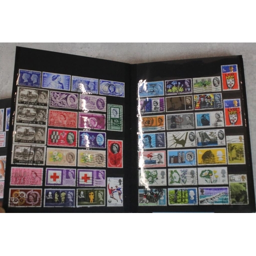 394 - Stamps and first day covers, three albums, to include British and Worldwide examples, a 1977 The Que... 