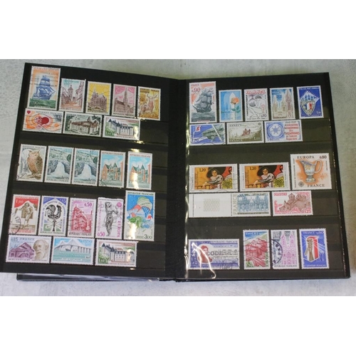 394 - Stamps and first day covers, three albums, to include British and Worldwide examples, a 1977 The Que... 