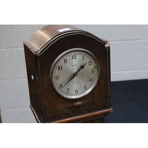 475B - Early 20th century ‘ Genalex ‘ Oak Grandmother Clock, 133cm high