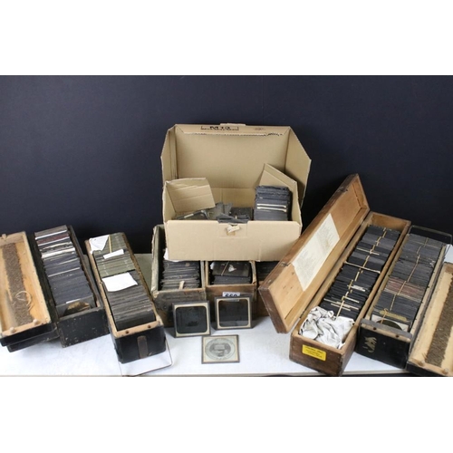 660 - Eight boxes of magic lantern slides, subjects to include: religious interest, hymns etc