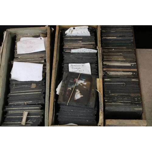 660 - Eight boxes of magic lantern slides, subjects to include: religious interest, hymns etc