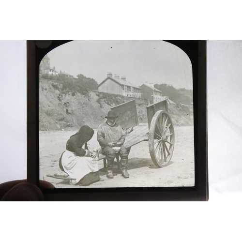 661 - Four boxes of magic lantern slides, subjects to include: nautical, topographical, seaside scenes inc... 