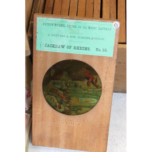 663 - Four boxes of magic lantern slides in wooden slipper slide frames, subjects to include: Venice, Carn... 