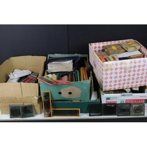 664 - Five boxes of magic lantern slides, subjects to include: stories, Everett Edgcumbe London electrical... 