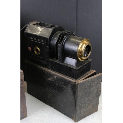 665 - Four magic lanterns / projectors to include The Praestantia - Riley Bros Bradford, Aldis electric sl... 