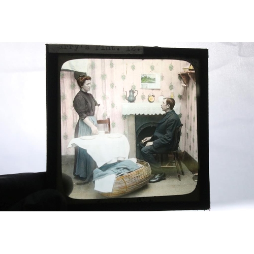 669 - Collection of around 150 glass magic lantern slides to include mahogany framed examples and boxed st... 