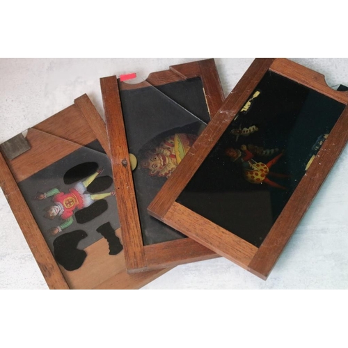 669 - Collection of around 150 glass magic lantern slides to include mahogany framed examples and boxed st... 