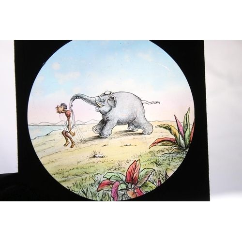 669 - Collection of around 150 glass magic lantern slides to include mahogany framed examples and boxed st... 