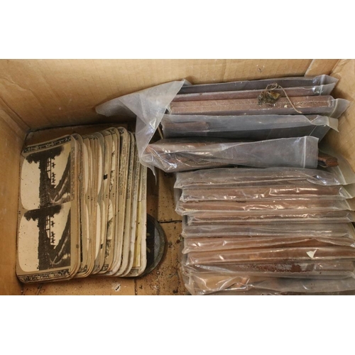 673 - Two wooden stereoscope viewers with around 30 stereoscope cards (mostly WWI, featuring trenches, wou... 