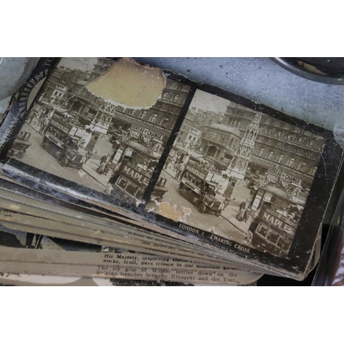 673 - Two wooden stereoscope viewers with around 30 stereoscope cards (mostly WWI, featuring trenches, wou... 