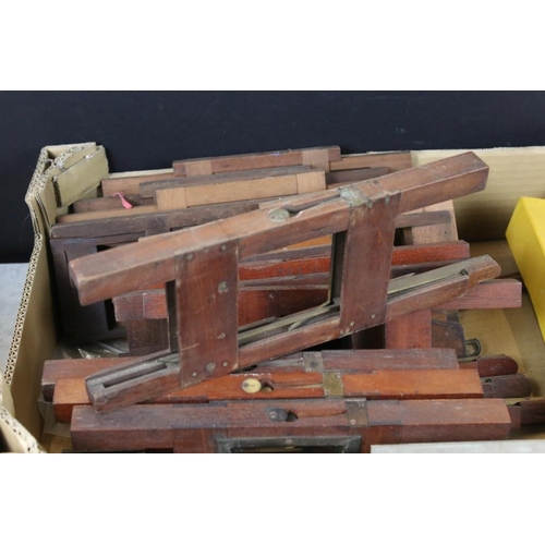 674 - Collection of over fifty 19th century wooden magic lantern slide carriers & frames, featuring a boxe... 