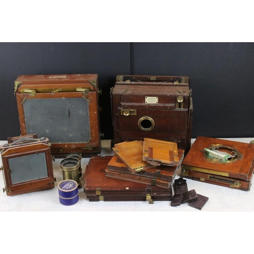 675 - Four late 19th century large format cameras to include a J. Lancaster & Son 'The 1890 Instantograph'... 