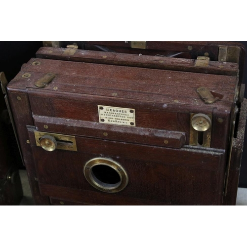 675 - Four late 19th century large format cameras to include a J. Lancaster & Son 'The 1890 Instantograph'... 