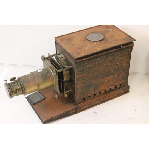 678 - Two Victorian magic lantern projectors to include a Newton & Co of London example. (In 'as found' co... 