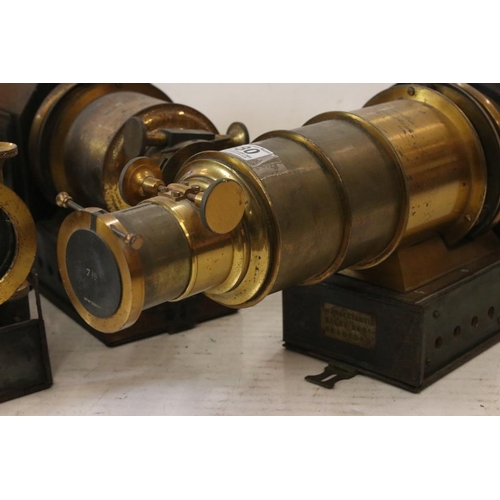 680 - Three late 19th century tinplate & gilt metal magic lantern projectors to include two Riley Bros of ... 