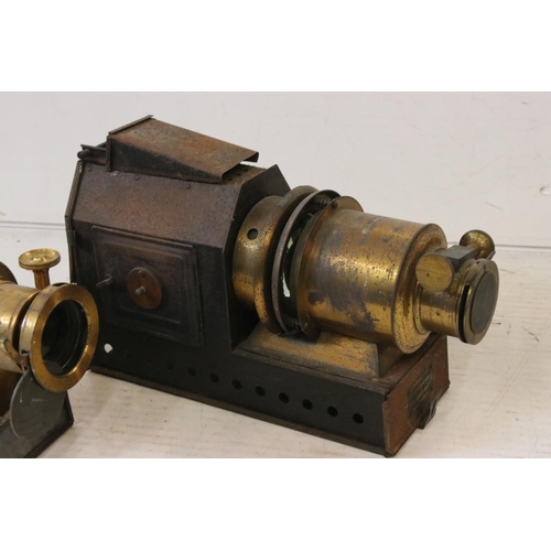 680 - Three late 19th century tinplate & gilt metal magic lantern projectors to include two Riley Bros of ... 