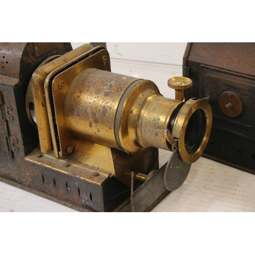 680 - Three late 19th century tinplate & gilt metal magic lantern projectors to include two Riley Bros of ... 