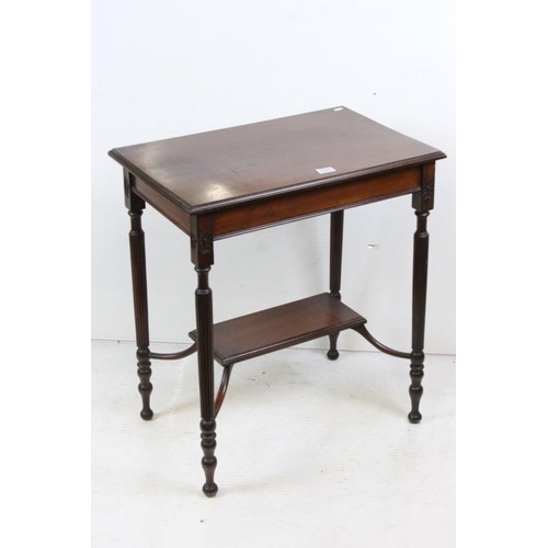 569 - Early 20th century Mahogany Side Table raised on fluted supports united by a shelf below, label to u... 