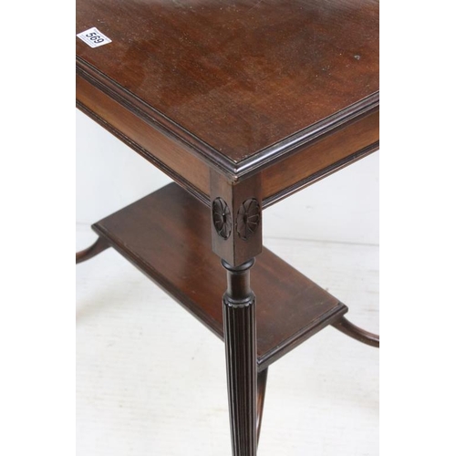 569 - Early 20th century Mahogany Side Table raised on fluted supports united by a shelf below, label to u... 