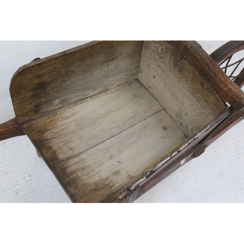 579 - Vintage Rustic Wooden Wheelbarrow with wooden iron bound and iron spoke wheel, 104cm long x 36cm hig... 