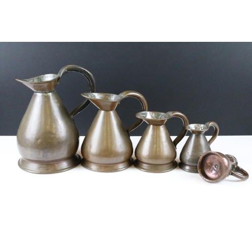 186 - Set of seven antique graduated copper haystack jug measures (from 1/2 gill to 1 gallon)