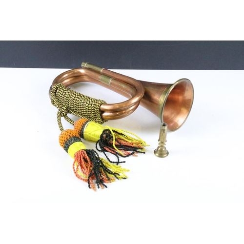 188 - Copper & brass bugle with braided tassels, together with a brass trumpet (37cm long), and two smalle... 