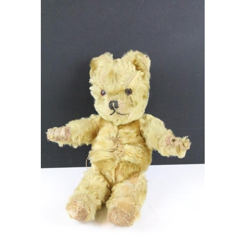 315 - Two early to mid 20th century teddy bears, one being golden mohair and the larger with straw filled ... 