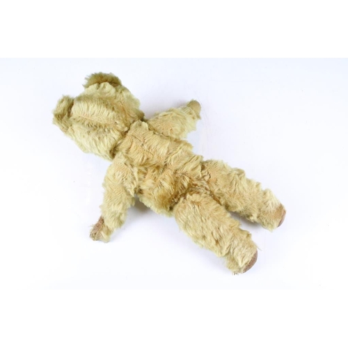 315 - Two early to mid 20th century teddy bears, one being golden mohair and the larger with straw filled ... 