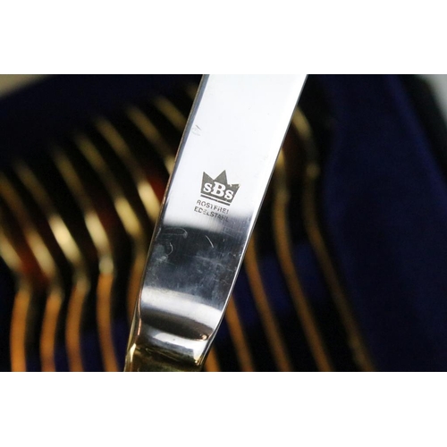 318 - Solingen German gold plated cutlery canteen for twelve, each having moulded detail to the handles an... 