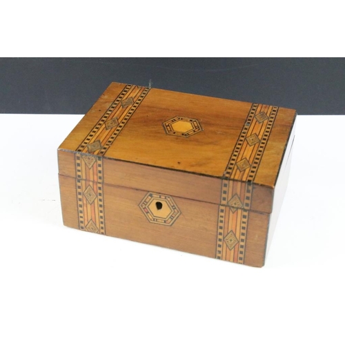 324 - Two Tunbridge ware jewellery boxes, an Indian brass trench art pot, oriental brass letter opener and... 