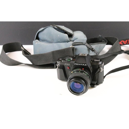 325 - Pentax P30 camera body having a macro 35-70mm lens, a Sigma 200mm lens, an Exacta Jhagee camera and ... 