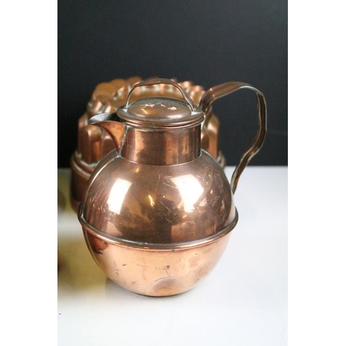 331 - Selection of Victorian copper jelly moulds together with a twin handled pot and lidded jug. round mo... 