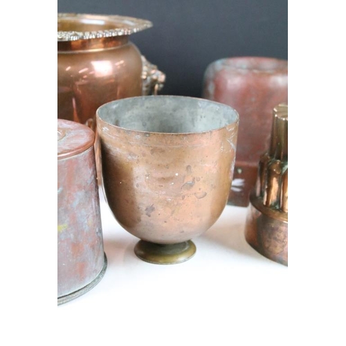 331 - Selection of Victorian copper jelly moulds together with a twin handled pot and lidded jug. round mo... 