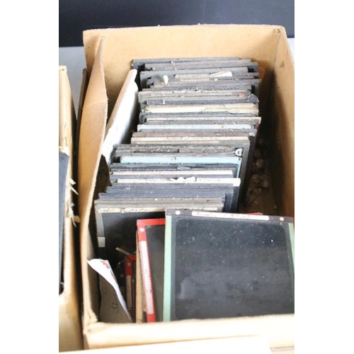 588 - Collection of magic lantern slides across six small boxes. The lot to include topographical, British... 