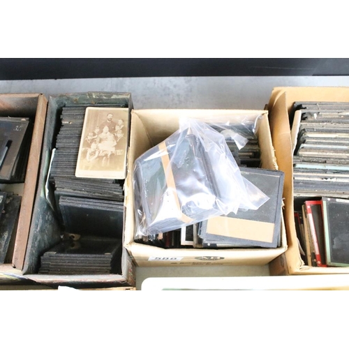 588 - Collection of magic lantern slides across six small boxes. The lot to include topographical, British... 