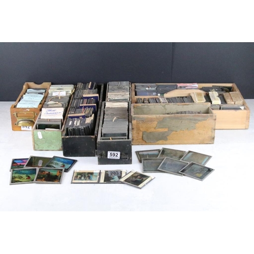 592 - A large collection of approx 200 x coloured glass magic lantern slides to include Alice in Wonderlan... 