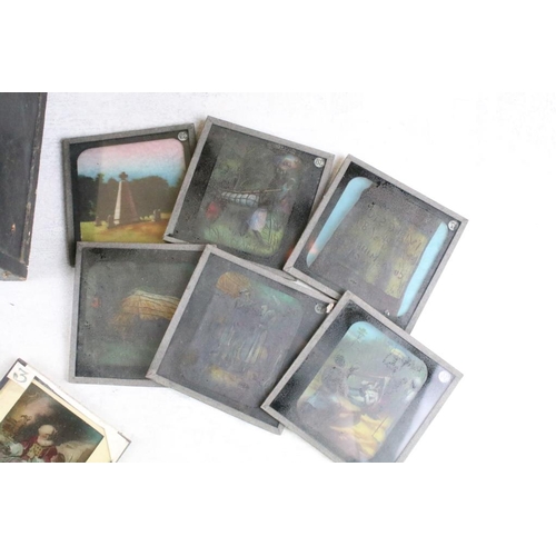 592 - A large collection of approx 200 x coloured glass magic lantern slides to include Alice in Wonderlan... 